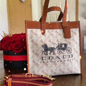 Coach Brown and Cream Tote Bag that is the sun that is casting spots on the bag
